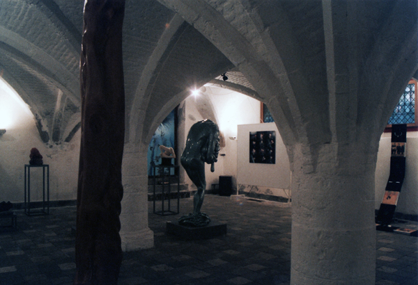 Cellar exhibition space with arches