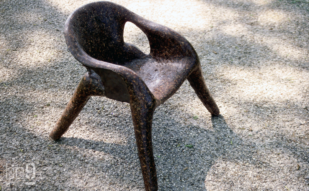 Pinecone chair on gravel from side