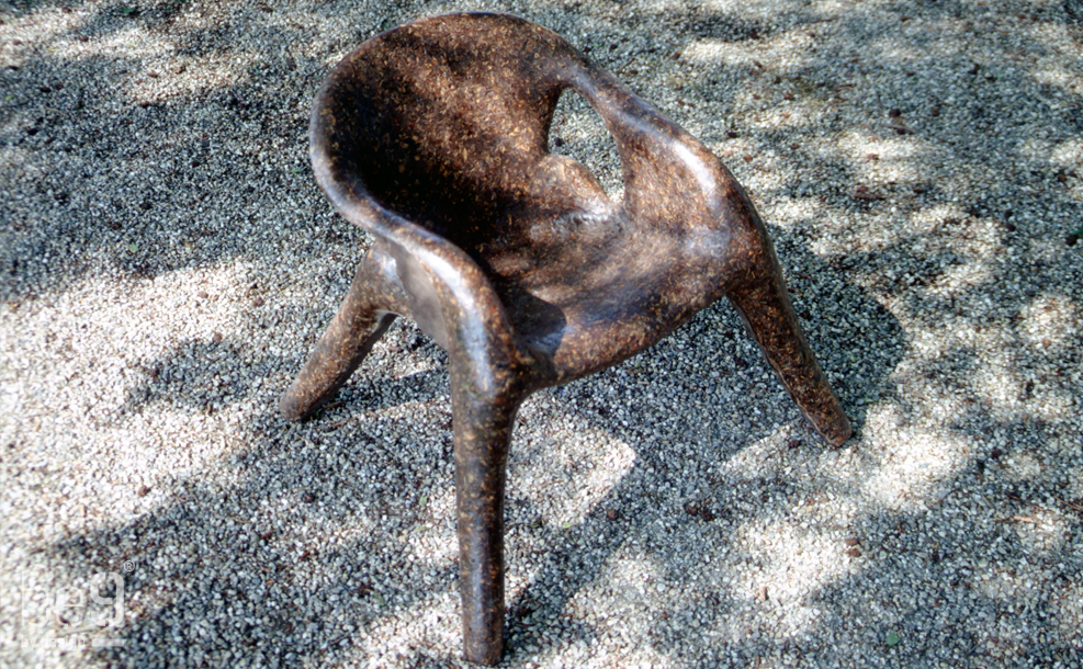 Pinecone chair on gravel from above